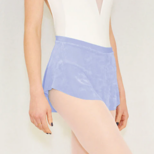 A ballerina wears a lilac flowy Bullet Pointe ballet skirt.