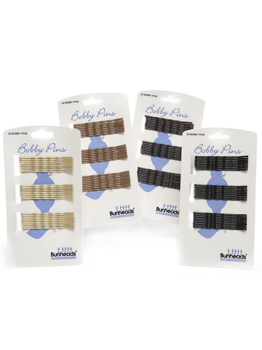 Packages of bobby pins; blonde, light brown, dark brown and black.
