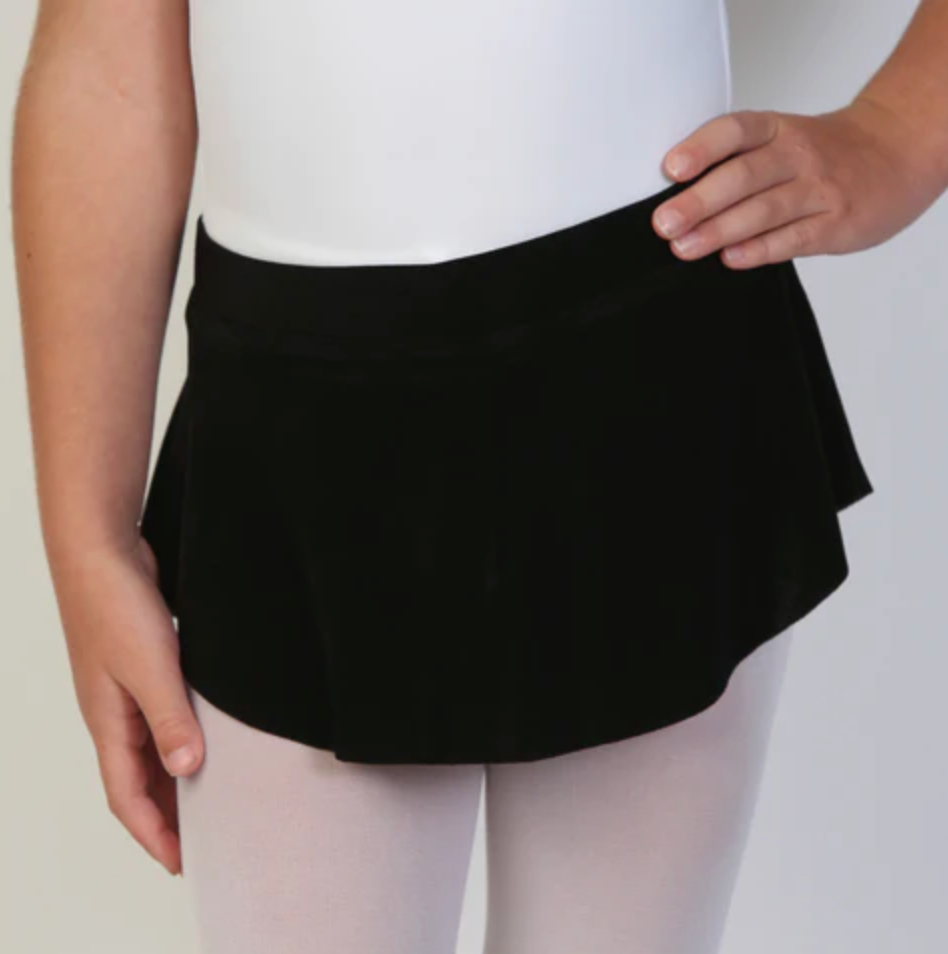 A young ballerina wears a black flowy Bullet Pointe ballet skirt.  