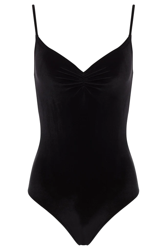 A simple black velvet leotard with a v-neck pinch front and spaghetti straps. 